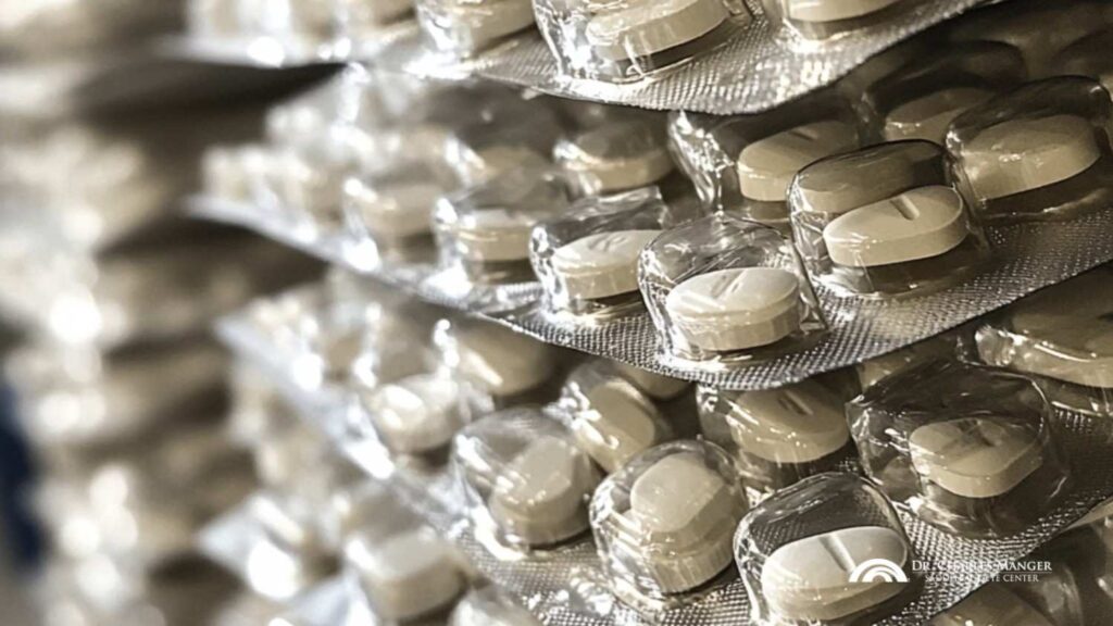 a stack of pills that have drug interactions contraindicated for LASIK surgery